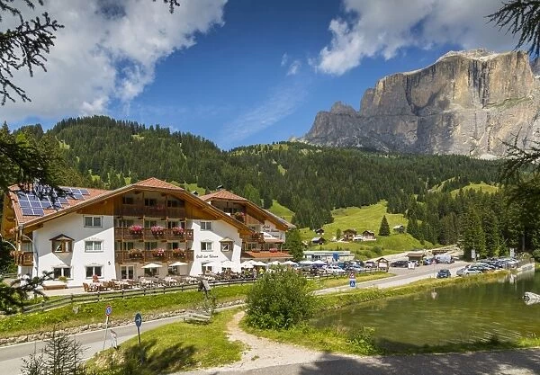 Hotel Lupo Bianco Wellness and Walking Canazei, Passo Pordoi with mountain backdrop