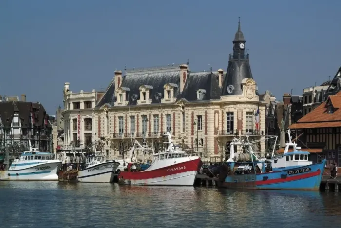 Framed Print : Hotel de Ville (town hall) and fishing boats at mouth of the River Touques Framed Print : Hotel de Ville (town hall) and fishing boats at mouth of the River Touques
