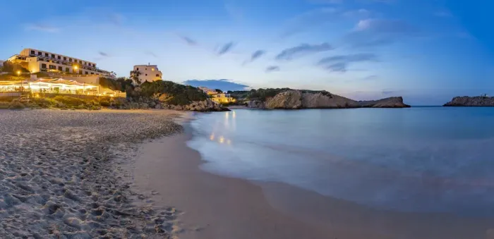 Framed Print : Hotels and whitewashed buildings overlooking beach at dusk in Arenal d en Castell, Es Mercadal, Menorca, Balearic Islands, Spain, Mediterranean, Europe