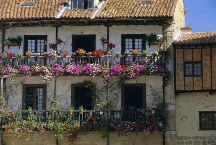 Framed Print : House with balconies and flowers Framed Print : House with balconies and flowers