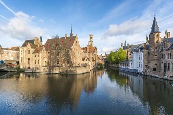 Houses and belfry reflected in the Dijver canal, Bruges, West Flanders province, Flemish region
