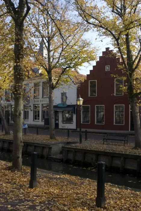 Framed Print : Houses along the canal, Edam, Netherlands, Europe Framed Print : Houses along the canal, Edam, Netherlands, Europe