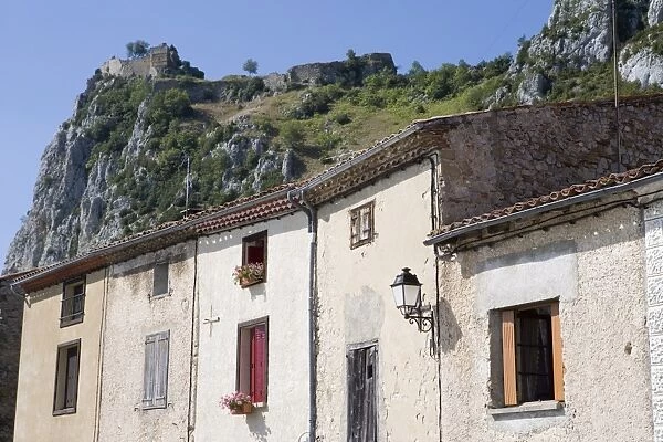 Houses and Cathar castle, Roquefixade, Ariege, Midi-Pyrenees, France, Europe