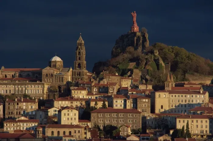 Framed Print : Houses and churches overlooked by a hilltop statue of the Virgin and child at Le Puy Framed Print : Houses and churches overlooked by a hilltop statue of the Virgin and child at Le Puy