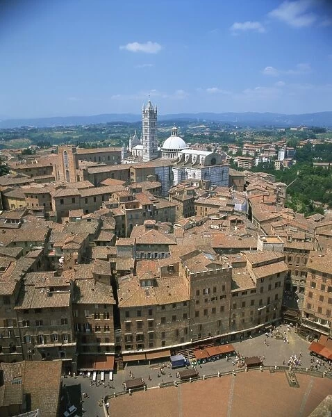Houses and churches on the skyline of the town of Siena, UNESCO World Heritage Site