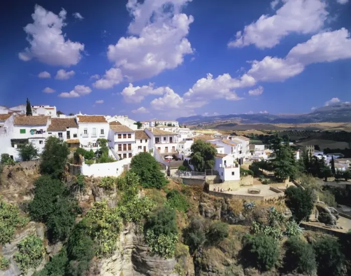 Framed Print : Houses on a gorge, old town of Ronda with cumulus clouds, Province Malaga, Andalusia, Spain, Europe Framed Print : Houses on a gorge, old town of Ronda with cumulus clouds, Province Malaga, Andalusia, Spain, Europe