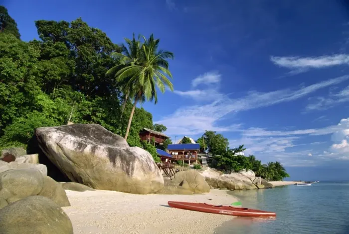Framed Print : Houses and kayak on tropical beach on Perhentian Besar Framed Print : Houses and kayak on tropical beach on Perhentian Besar