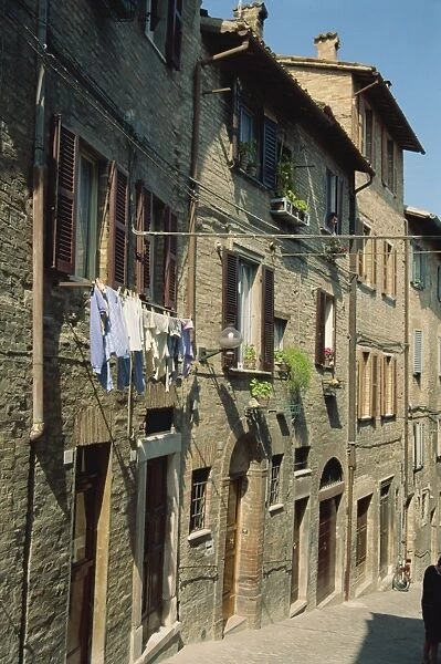 Houses on a narrow street in the town of Urbino