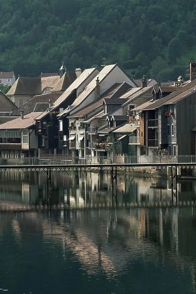 Houses overlooking the Loue river, and footbridge, Ornans, Jura, Franche-Comte