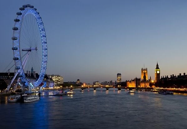 Houses of Parliament, Westminster and London Eye at dusk, London, England, United Kingdom, Europe