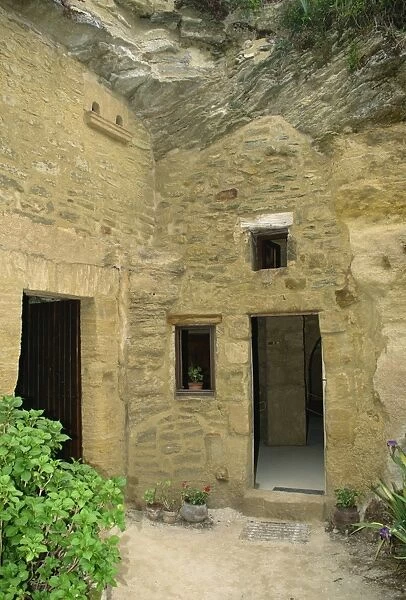 Houses in the rock in the troglodyte village of Rochemenier, near Angers