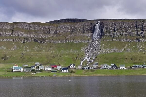 Houses at Sandur, across Sandsvatn lake, Sandoy, Faroe Islands (Faroes), Denmark, Europe