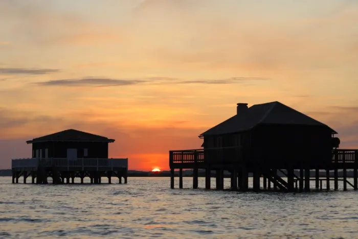 Framed Print : Houses on stilts at sunset, Bay of Arcachon, Gironde, Aquitaine, France, Europe