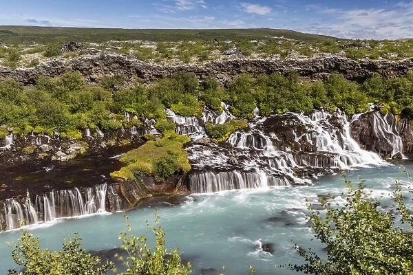 Hraunfossar, a series of waterfalls pouring into the Hvita River, Borgarfjordur, western Iceland