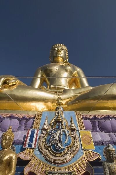 Huge golden Buddha on the banks of the Mekong River at Sop Ruak, Thailand