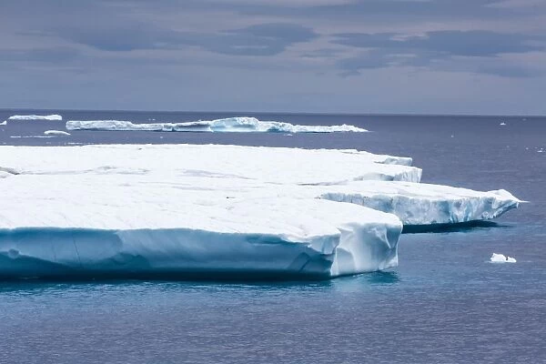 Huge tabular iceberg in Isabella Bay, Baffin Island, Nunavut, Canada, North America