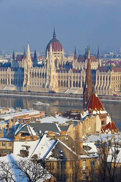 Hungarian Parliament illuminated by warm light on a winter afternoon, Budapest, Hungary, Europe