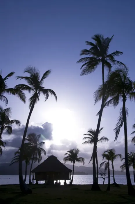 Framed Print : Hut over the water and palm trees silhouetted at sunset, Yandup Island Framed Print : Hut over the water and palm trees silhouetted at sunset, Yandup Island