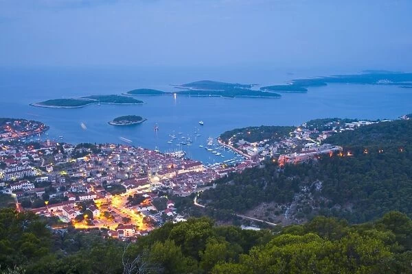 Hvar Town and the Pakleni Islands (Paklinski Islands) at night, Dalmatian Coast, Adriatic Sea, Croatia, Europe