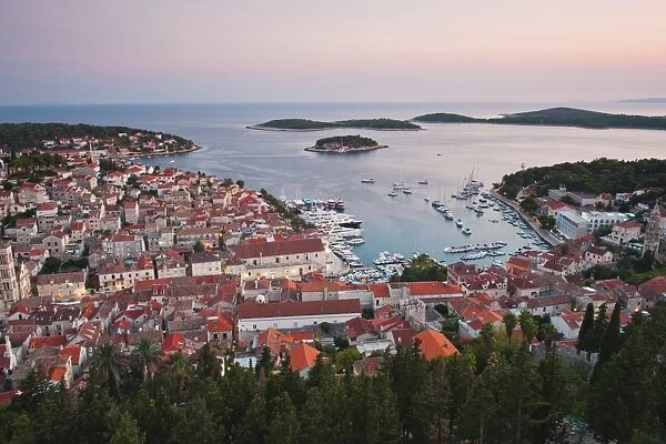 Hvar Town at sunset taken from the Spanish Fortress (Fortica), Hvar Island, Dalmatian Coast, Adriatic, Croatia, Europe
