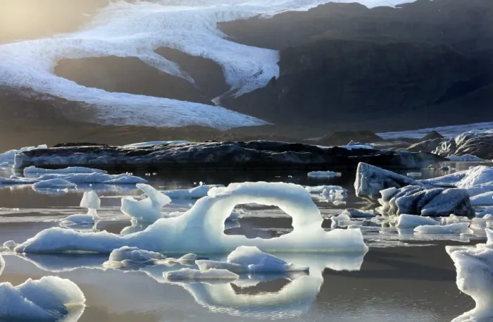 Framed Print : Ice arch among icebergs floating on Fjallsarlon lagoon, near Jokulsarlon, South Iceland Framed Print : Ice arch among icebergs floating on Fjallsarlon lagoon, near Jokulsarlon, South Iceland