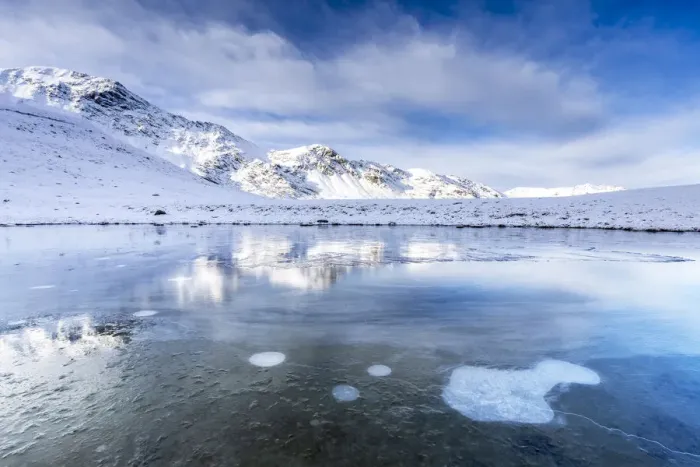 Framed Print : Ice bubbles on the icy surface of an alpine lake, Stelvio Pass, Valtellina, Lombardy Framed Print : Ice bubbles on the icy surface of an alpine lake, Stelvio Pass, Valtellina, Lombardy