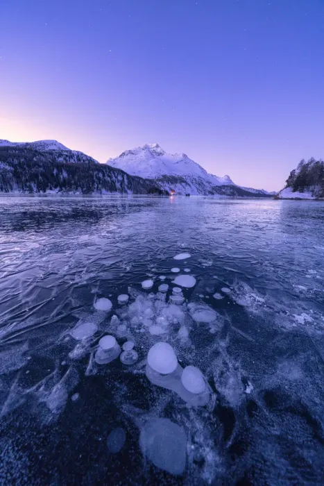 Framed Print : Ice bubbles trapped in Lake Sils with Piz Da La Margna in background at dawn, Engadine Framed Print : Ice bubbles trapped in Lake Sils with Piz Da La Margna in background at dawn, Engadine