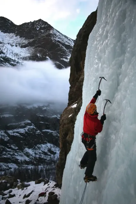 Framed Print : An ice climber makes his way up a frozen waterfall near Cogne, above the Aosta Valley Framed Print : An ice climber makes his way up a frozen waterfall near Cogne, above the Aosta Valley