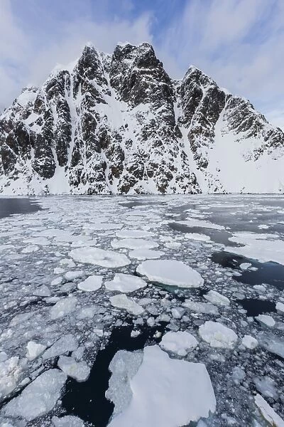 Ice floes choke the waters of the Lemaire Channel, Antarctica, Polar Regions