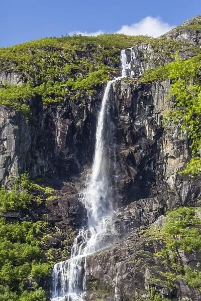 Ice melt waterfall on the Olden River as it flows along Briksdalen, Olden, Nordfjord, Norway, Scandinavia, Europe