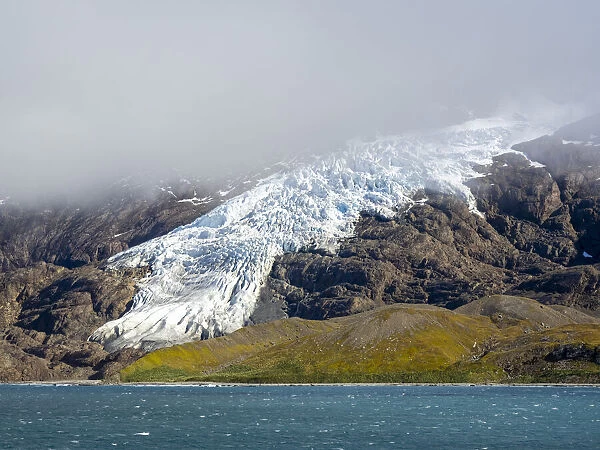 Ice and snow covered mountains with glaciers in King Haakon Bay, South Georgia, South Atlantic, Polar Regions