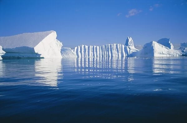 Icebergs exhibiting fluting and honeycomb textures, Antarctica