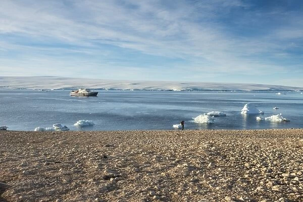 Icebreaker anchoring behind an iceberg, Paulet Island, Antarctica, Polar Regions