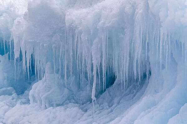 Icicles forming from melting and refreezing on iceberg at Devil Island, Weddell Sea