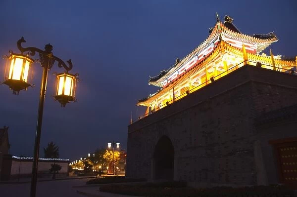 Illuminated City Gate and watch tower, UNESCO World Heritage Site, Qufu City