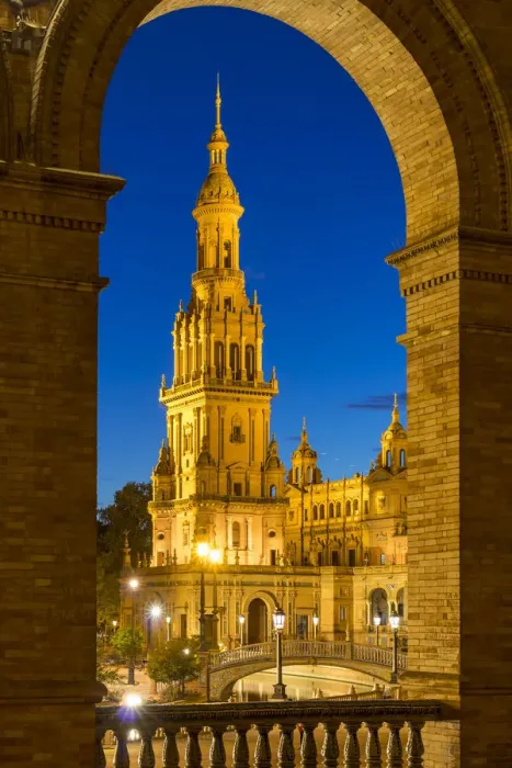 Framed Print : Illuminated Northern Tower at Plaza de EspaA±a during dusk, Seville, Andalusia