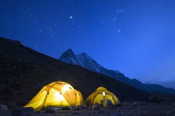 Illuminated tents at Island Peak Base Camp, Solu Khumbu Everest Region