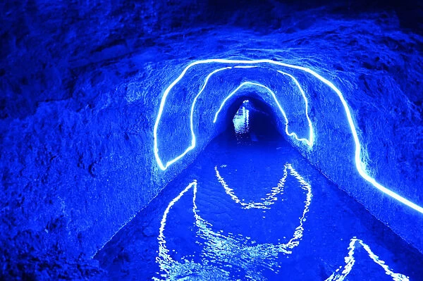 Illuminated underground karez (water canals) in the oasis town of Turpan, Silk Road