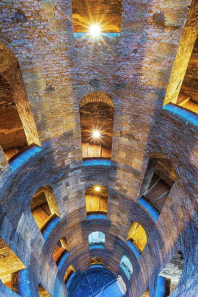 Illuminated view of the bottom of Saint Patrick's well with a spiral staircase, Orvieto, Terni province, Umbria region, Italy, Europe