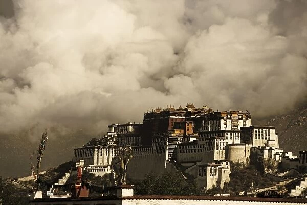 Image taken in 2006 and partially toned, dramatic clouds building behind the Potala Palace
