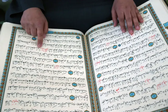 Framed Print : Imam reading the Quran in a mosque, Seine-e-Marne, France, Europe Framed Print : Imam reading the Quran in a mosque, Seine-e-Marne, France, Europe