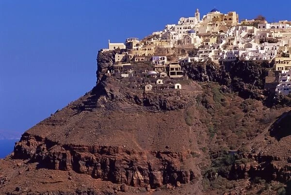Imerovigli village perched on red volcanic hill
