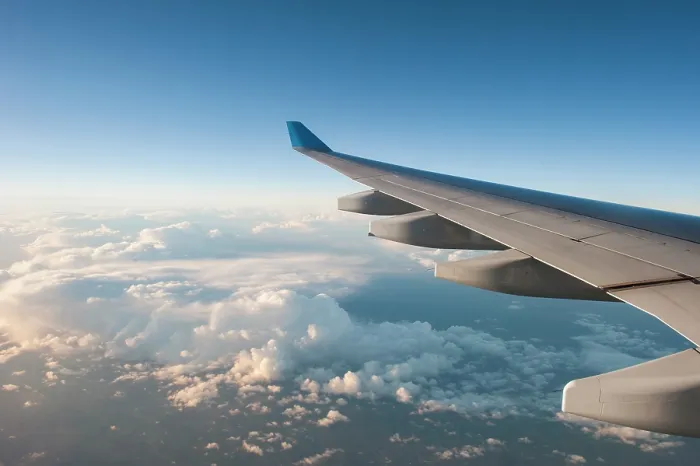 Framed Print : In-flight airliner wing seen through the window, Guadeloupe Framed Print : In-flight airliner wing seen through the window, Guadeloupe