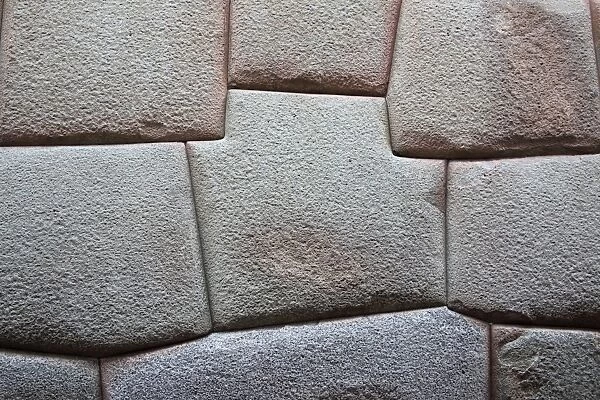 Inca Stone wall made from huge granite blocks fitted skillfully together using no cement