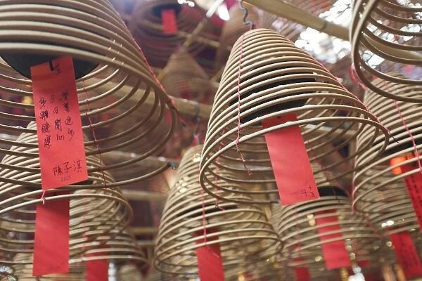 Incense coils hang from the roof of the Man Mo Temple, built in 1847, Sheung Wan