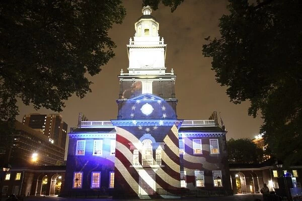 Independence Hall illuminated at night with sound and light show in Philadelphia