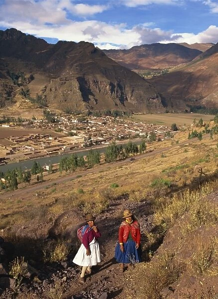 Two Indian women outside the town of Pisac in the Cuzco area of Peru, South America