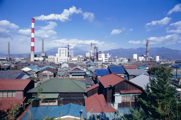 Framed Print : Industrial complex of paper mill and city skyline