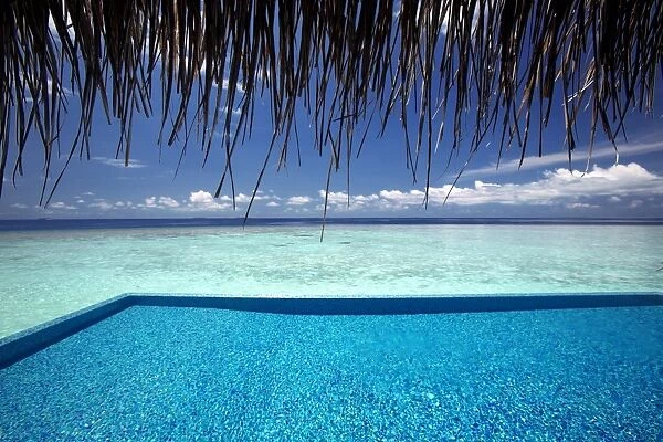 Infinity pool and lagoon, Maldives, Indian Ocean, Asia