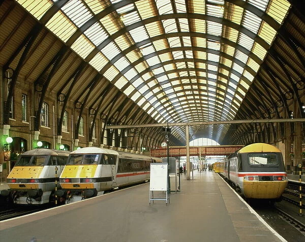 Intercity trains and platform at Kings Cross station in London, England